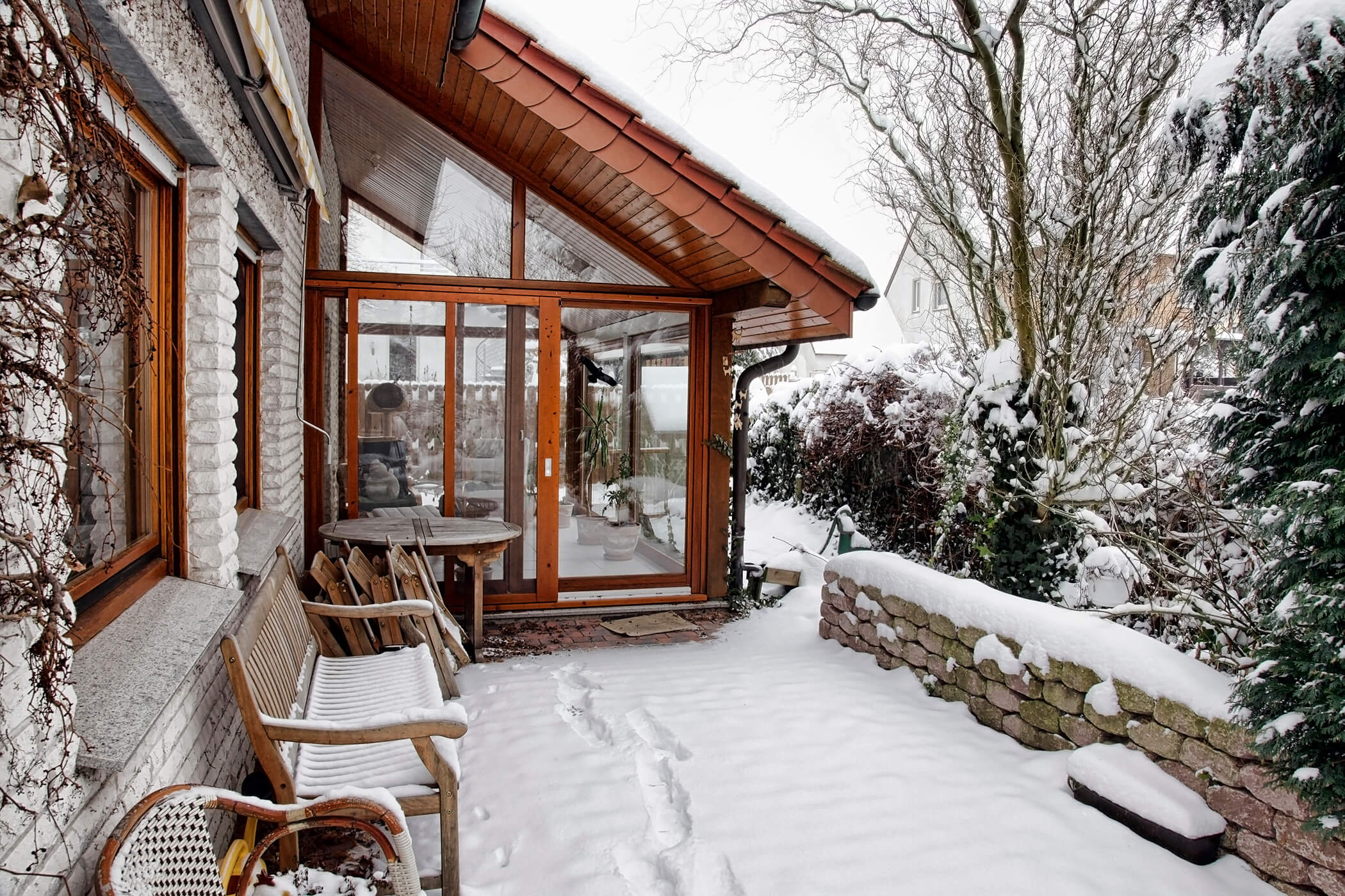 Terrace during winter with entrance to the conservatory